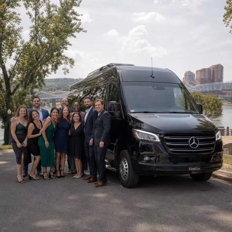 Group beside a Mercedes Sprinter limo from the Cincinnati fleet