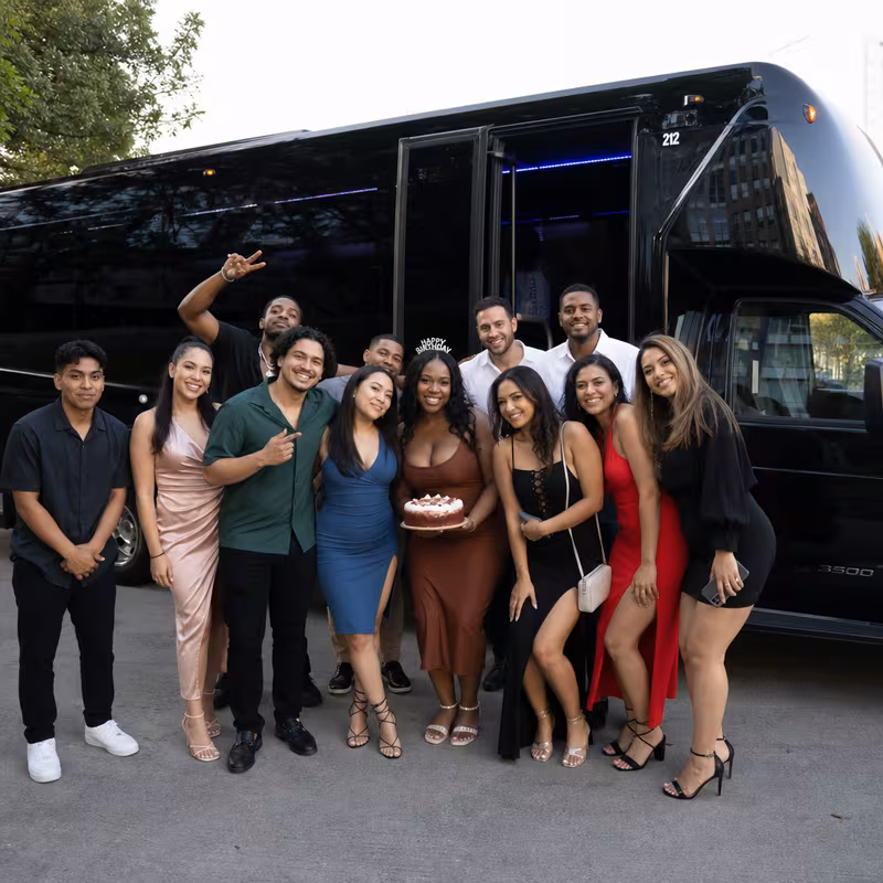 Party bus interior with wraparound leather seating and LED lighting in Cincinnati