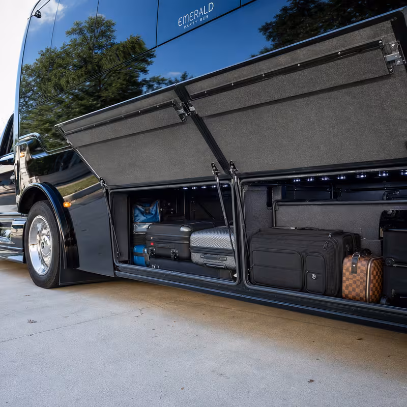 Party bus interior with wraparound leather seating and LED lighting in Cincinnati